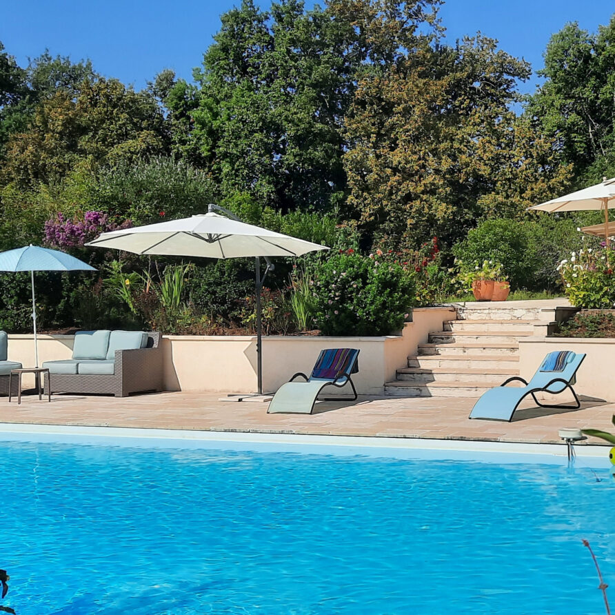 Chambres-dHotes-La-Bonne-Voie-House-and-Pool-and-Parasols-in-Summer